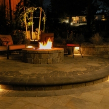 Fire pit with stepped lighting